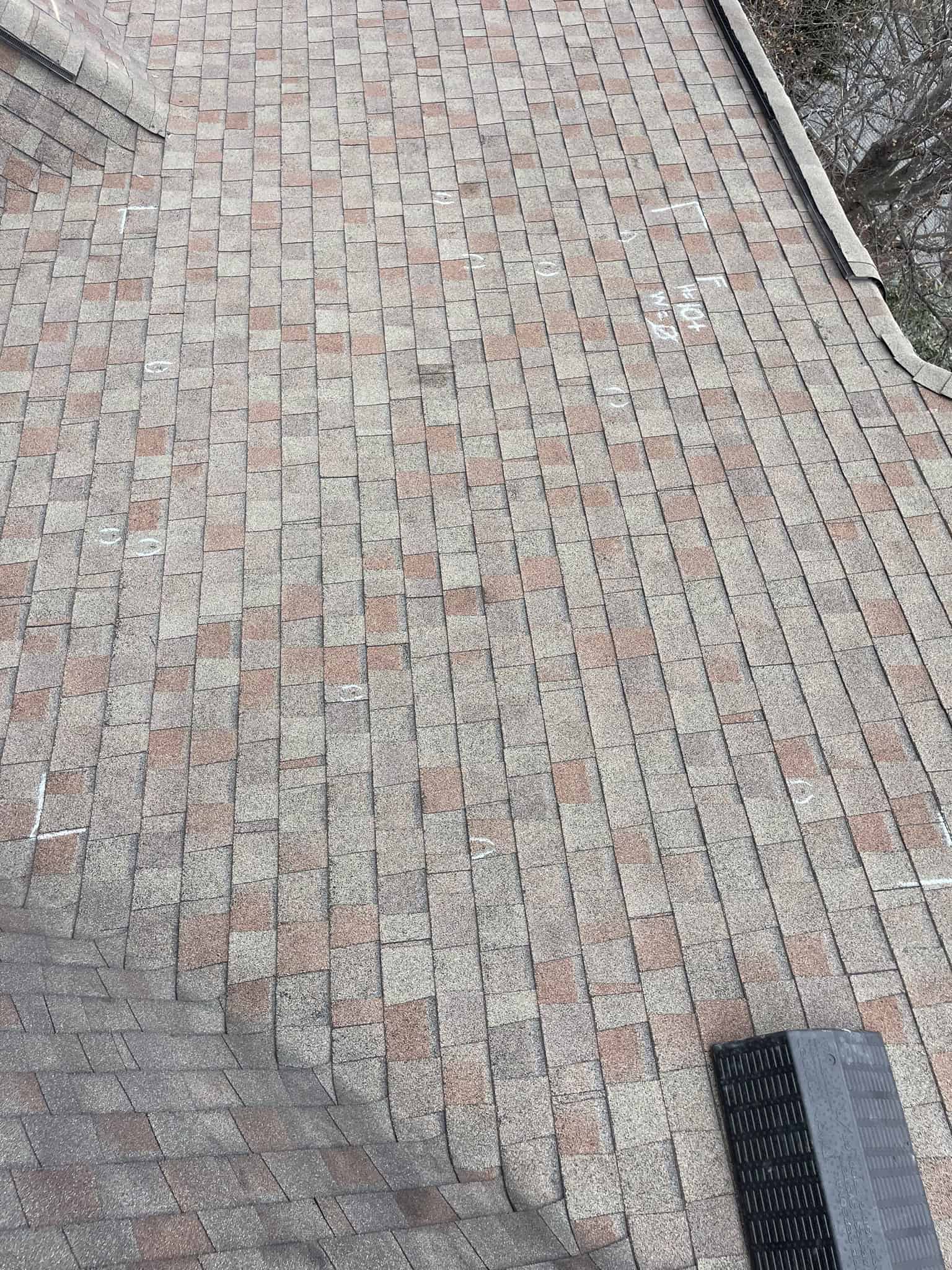 Roof warranty inspection in Greensboro neighborhood