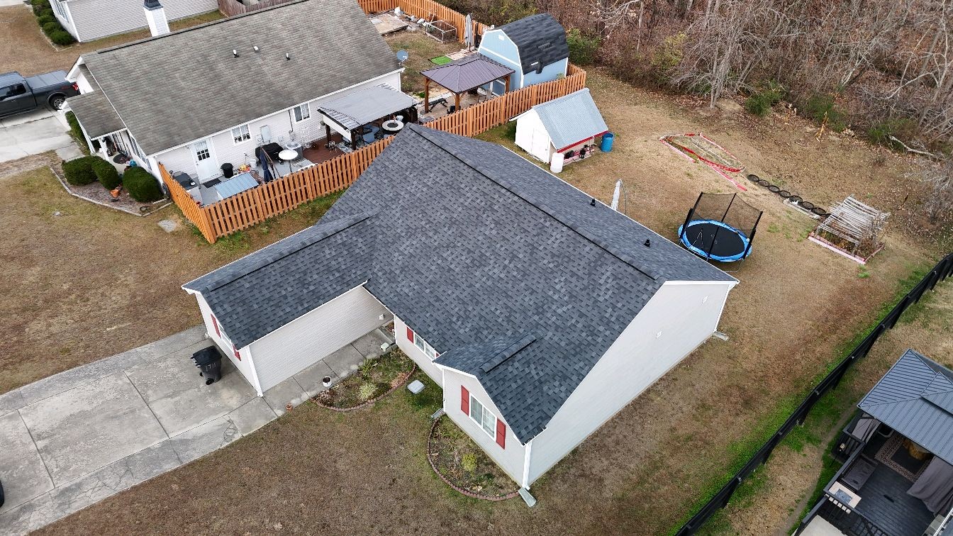 Completed residential asphalt shingle roof replacement in Greensboro NC by Old Timers Roofing