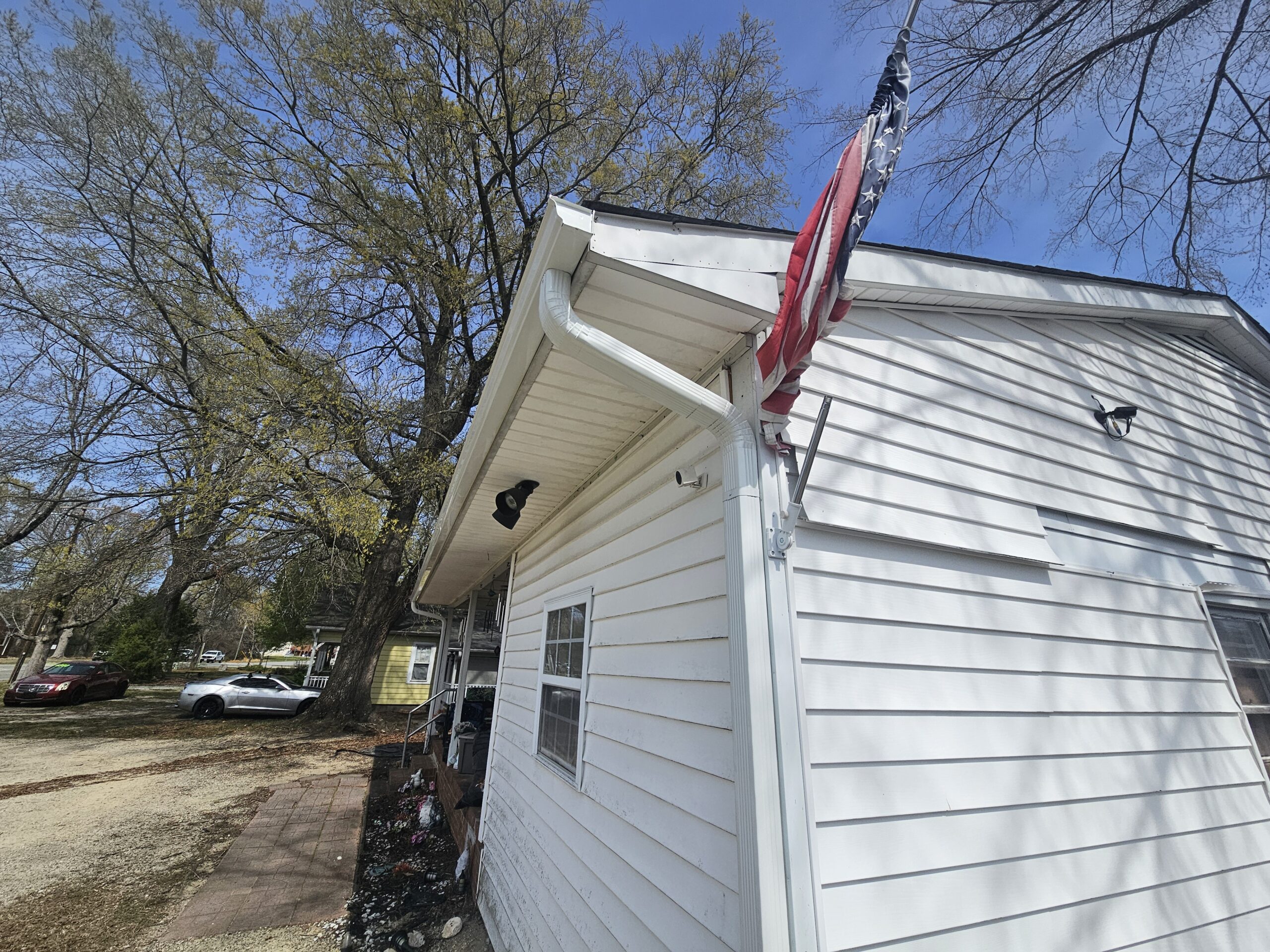 New gutter replacement completed by Old Timers Roofing for a Greensboro veteran